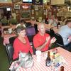 Mary Ann Brezina with Coach Tony Levine watching Bobby Brezina being interviewed on the Tony Levine Radio Show at the Ragin Cagin on Richmond.